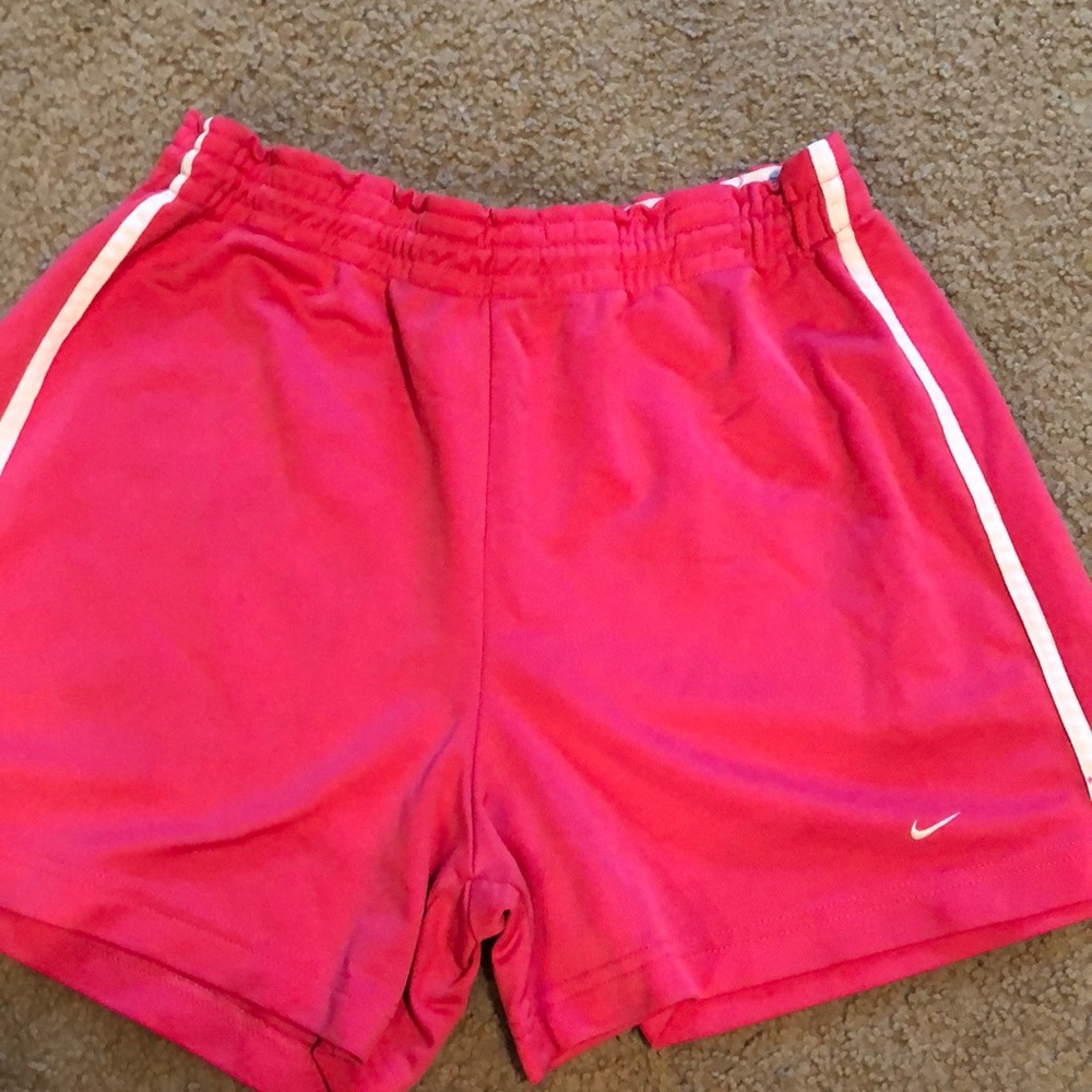 Pink Nike athletic shorts
